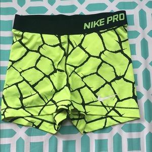 Yellow and black nike pros